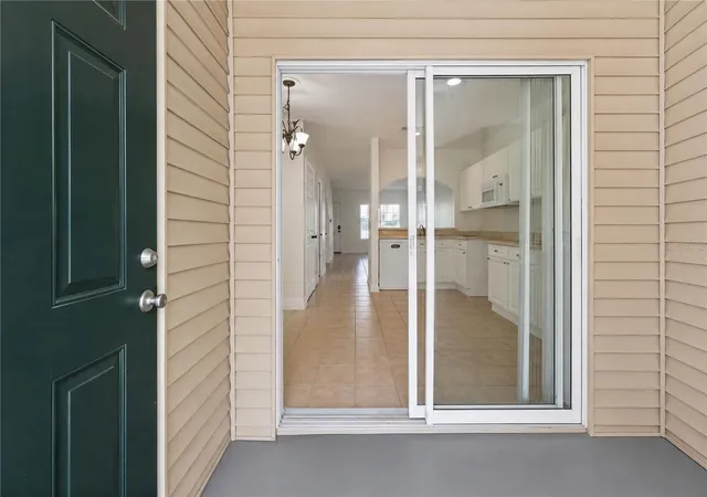 Photo 3 of Townhouse for sale at 4212 Plantation Cvs Dr, Orlando, FL 32810 | MLS# O6389486 | Listing updated on 2026-09-23