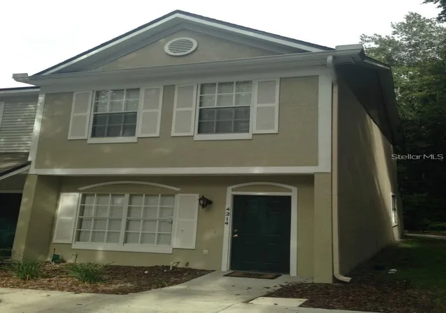 Photo 1 of Townhouse for sale at 4214 Plantation Cvs Dr, Orlando, FL 32810 | MLS# O6389504 | Listing updated on 2026-04-03