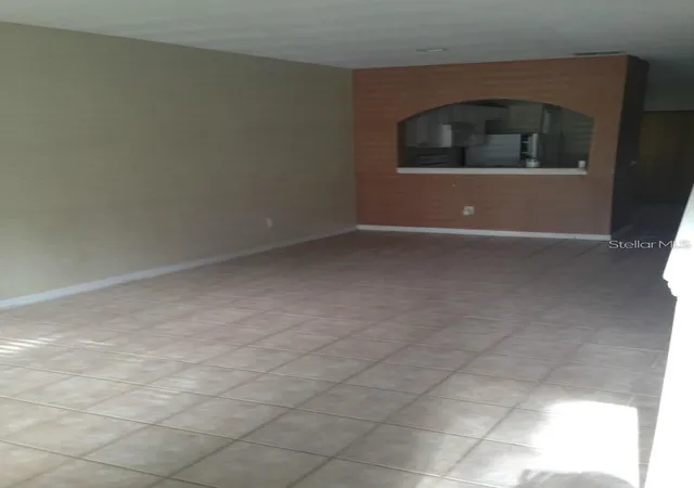 Photo 2 of Townhouse for sale at 4214 Plantation Cvs Dr, Orlando, FL 32810 | MLS# O6389504 | Listing updated on 2026-04-03