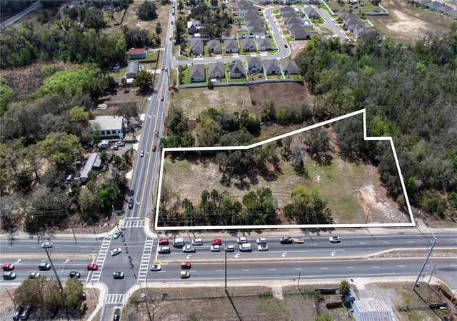 1st image of 711 Ronald Reagan Pkwy, Davenport, FL 33837 | MLS# O6389516