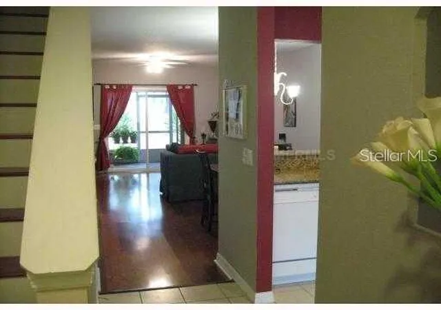 Photo 2 of Townhouse for sale at 4169 Plantation Cvs Dr, Orlando, FL 32810 | MLS# O6389523 | Listing updated on 2026-03-12