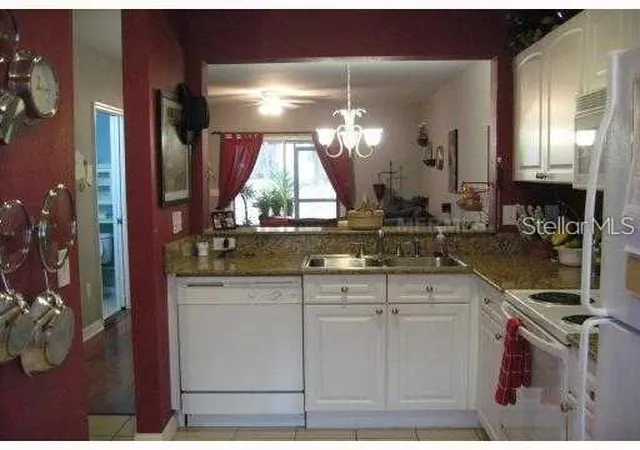 Photo 3 of Townhouse for sale at 4169 Plantation Cvs Dr, Orlando, FL 32810 | MLS# O6389523 | Listing updated on 2026-03-12