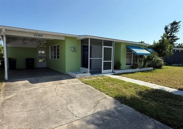 Photo 1 of Single family home for sale at 22180 Midway Blvd, Port Charlotte, FL 33952 | MLS# C7523165 | Listing updated on 2026-05-11