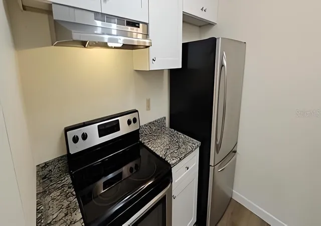 2nd image of 1712 Belleair Forest Dr, BELLEAIR, FL 33756