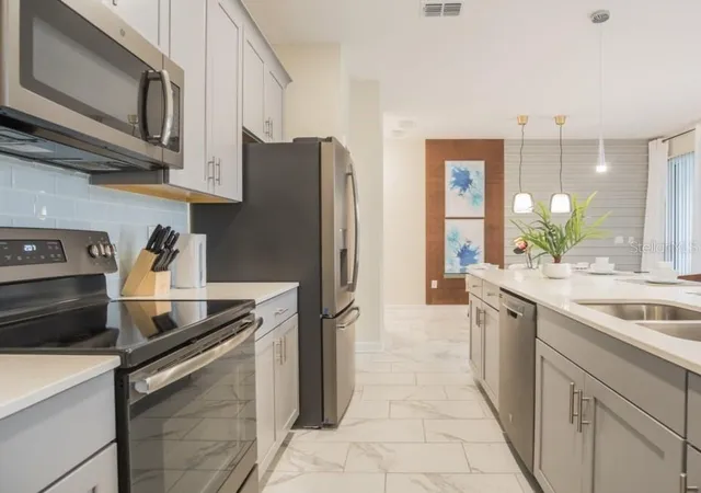 Photo 4 of Townhouse for sale at 468 Ocean Crse Ave, Davenport, FL 33896 | MLS# O6389824 | Listing updated on 2026-10-16