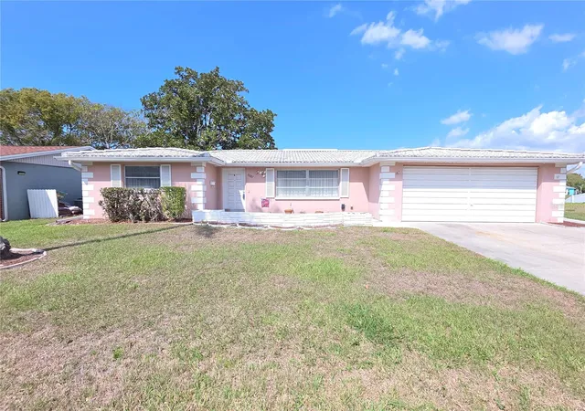 1st image of 7207 Ashwood Dr, Port Richey, FL 34668 | MLS# W7883825
