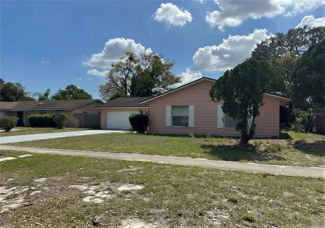 Photo 2 of Single family home for sale at 6142 Tebbetts Dr, Orlando, FL 32808 | MLS# O6389928 | Listing updated on 2026-09-14