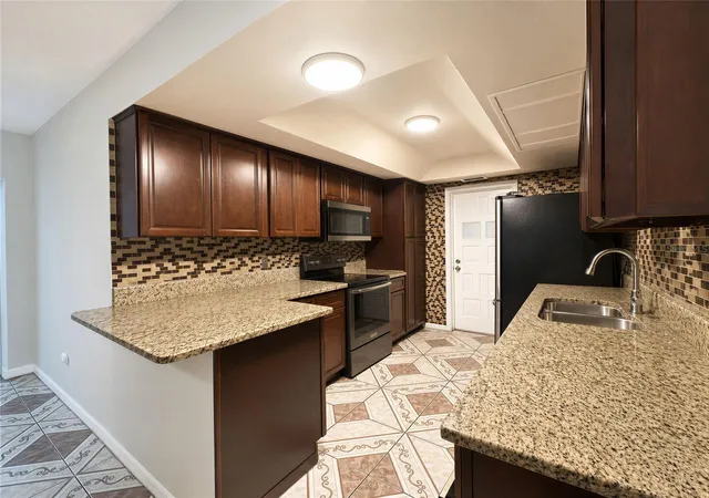 Photo 3 of Single family home for sale at 6142 Tebbetts Dr, Orlando, FL 32808 | MLS# O6389928 | Listing updated on 2026-09-14