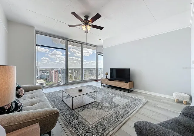 Photo 1 of Condo for sale at 155 S Court Ave #1911, Orlando, FL 32801 | MLS# O6389978 | Listing updated on 2026-10-21
