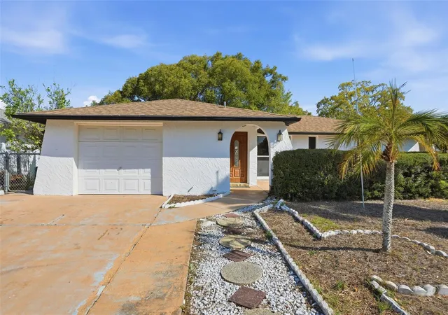 Photo 3 of Single family home for sale at 7427 Fireside Dr, Port Richey, FL 34668 | MLS# TB8485749 | Listing updated on 2026-09-21