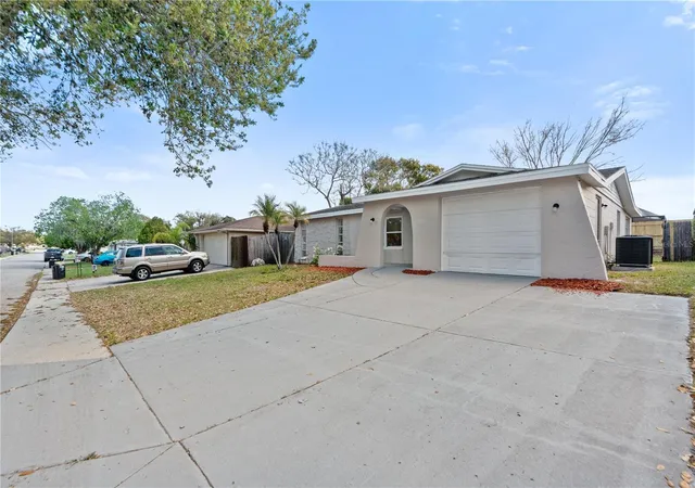 Photo 2 of Single family home for sale at 9020 Hunt Clb Ln, Port Richey, FL 34668 | MLS# W7883846 | Listing updated on 2026-10-02