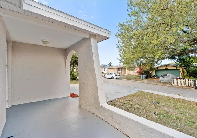 Photo 3 of Single family home for sale at 9020 Hunt Clb Ln, Port Richey, FL 34668 | MLS# W7883846 | Listing updated on 2026-10-02