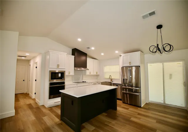 Photo 3 of Single family home for sale at 2235 Wautoma Pl, Orlando, FL 32818 | MLS# O6390653 | Listing updated on 2026-08-16