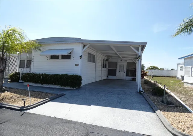 Photo 1 of Manufactured home for sale at 3608 Tiki Dr, Holiday, FL 34691 | MLS# W7883910 | Listing updated on 2026-09-14