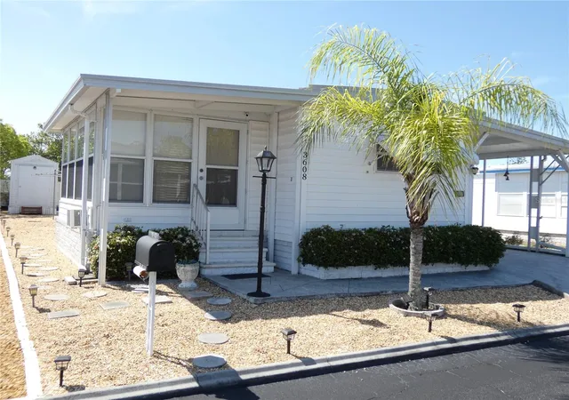 Photo 2 of Manufactured home for sale at 3608 Tiki Dr, Holiday, FL 34691 | MLS# W7883910 | Listing updated on 2026-09-14