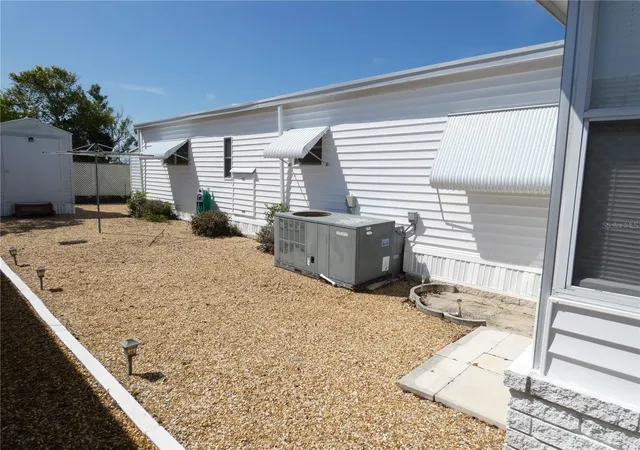 Photo 3 of Manufactured home for sale at 3608 Tiki Dr, Holiday, FL 34691 | MLS# W7883910 | Listing updated on 2026-09-14