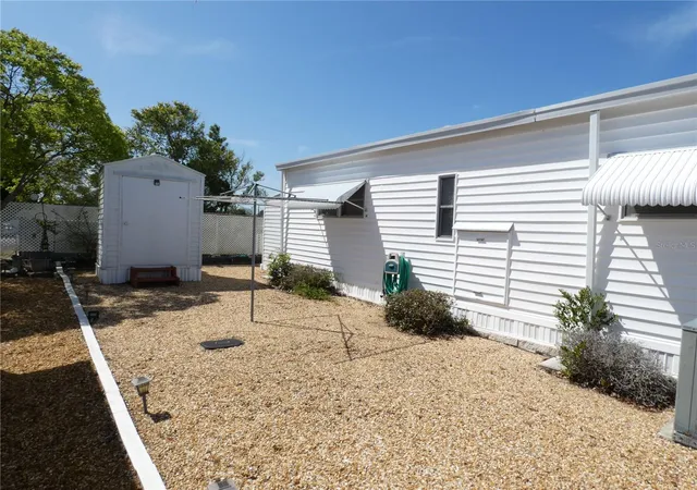 Photo 4 of Manufactured home for sale at 3608 Tiki Dr, Holiday, FL 34691 | MLS# W7883910 | Listing updated on 2026-09-14