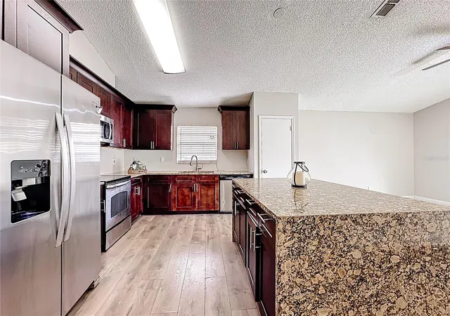 Photo 2 of Sale Pending at 6582 Meritmoor Cir, Orlando, FL 32818 | MLS# O6390894 | Listing updated on 2026-10-22