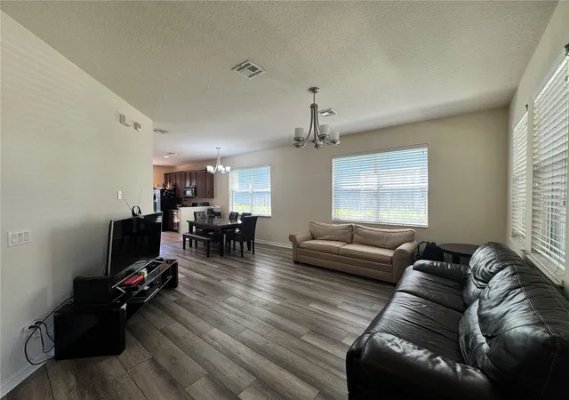 Photo 3 of Townhouse for sale at 8484 Leeland Archer Blvd, Orlando, FL 32836 | MLS# O6390960 | Listing updated on 2026-06-09