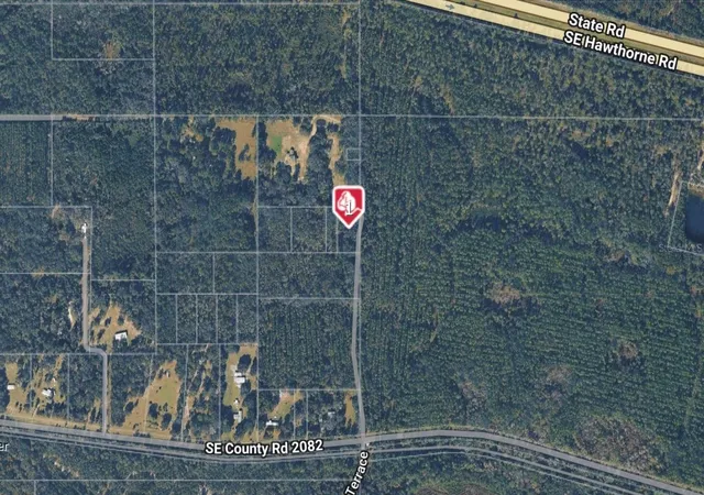 1st image of 10702 Se County Road 2082, Gainesville, FL 32641 | MLS# O6390981