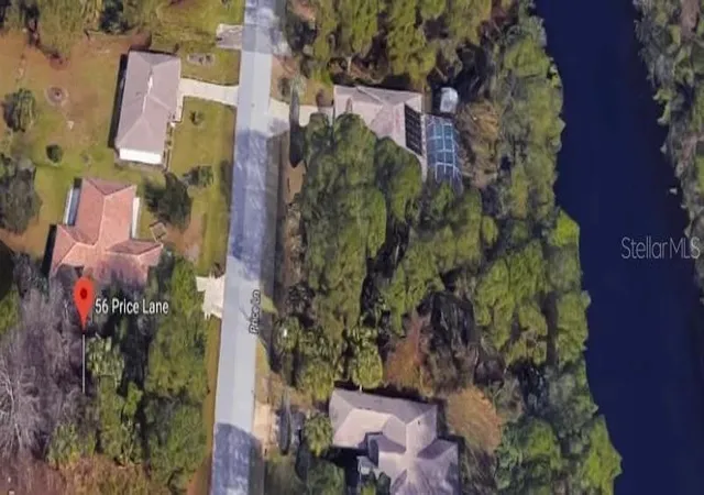 Photo 1 of Land for sale at 56 Price Ln, Palm Coast, FL 32164 | MLS# FC316953 | Listing updated on 2026-03-23