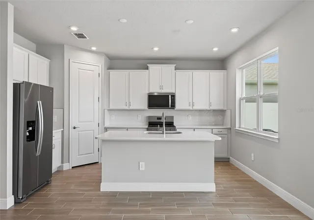 Photo 4 of Single family home for sale at 13140 Oxeye Ln, Parrish, FL 34219 | MLS# TB8487257 | Listing updated on 2026-10-28