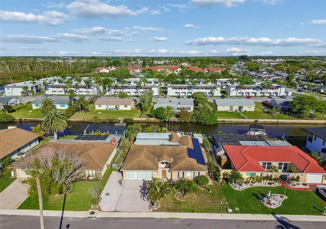 Photo 5 of Single family home for sale at 9900 Is Harbor Dr, Port Richey, FL 34668 | MLS# TB8487509 | Listing updated on 2026-09-02