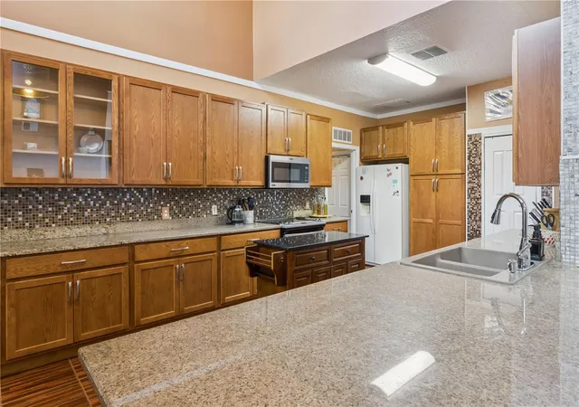 Photo 3 of Single family home for sale at 2606 Royal Fern Pl, Kissimmee, FL 34758 | MLS# O6391472 | Listing updated on 2026-09-04