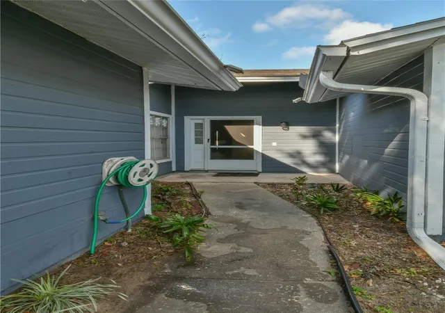 Photo 3 of Multi family home for sale at 7416 Little Pond Ct, Orlando, FL 32810 | MLS# O6391474 | Listing updated on 2026-07-31