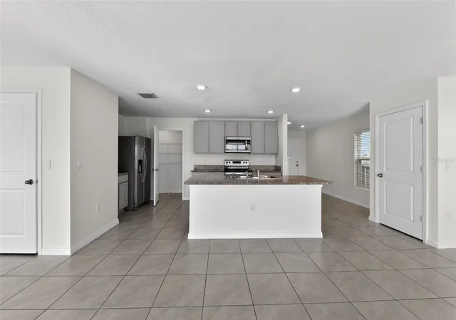 5th image of 439 Sunlit Coral St, Ruskin, FL 33570 | MLS# O6391603
