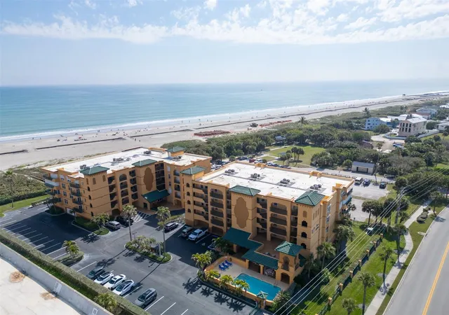 Photo 1 of Condo for sale at 8472 Ridgewood Ave #201, Cape Canaveral, FL 32920 | MLS# O6391781 | Listing updated on 2026-09-12