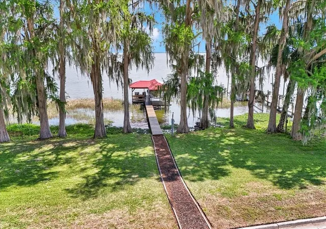1st image of 405 Lakeshore Dr, Leesburg, FL 34748 | MLS# OM721071