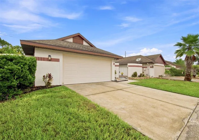 Photo 2 of Single family home for sale at 7123 Silvermill Dr, Tampa, FL 33635 | MLS# TB8488026 | Listing updated on 2026-09-15