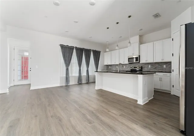 Photo 3 of Townhouse for sale at 13427 Stoddart Ave, Orlando, FL 32827 | MLS# S5146139 | Listing updated on 2026-08-24