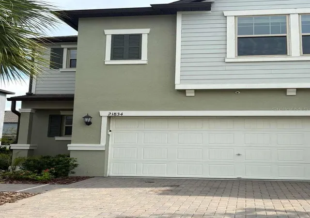 Photo 2 of Townhouse for sale at 21834 Adriatic Ln, Land O Lakes, FL 34637 | MLS# TB8488405 | Listing updated on 2026-08-31