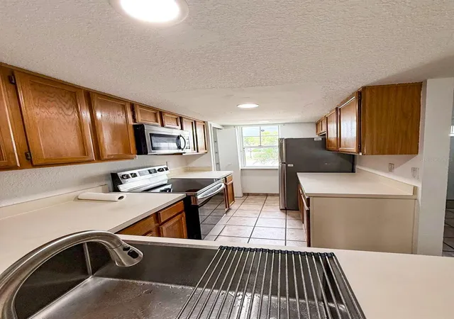 4th image of 7522 Hollowell Dr, Tampa, FL 33615 | MLS# TB8488531