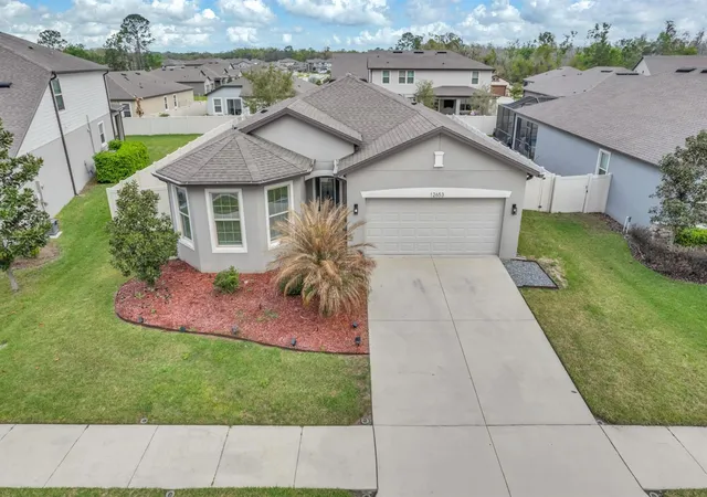 Photo 2 of Single family home for sale at 12653 Palapa Loop, Spring Hill, FL 34610 | MLS# W7884078 | Listing updated on 2026-03-21