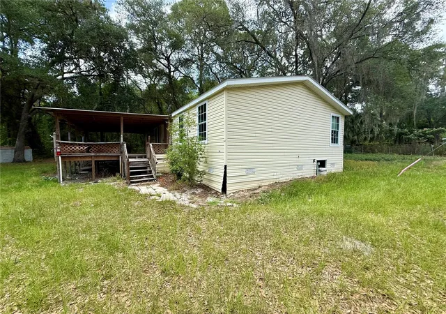 5th image of 5756 Ne 165Th Terrace Rd, Silver Springs, FL 34488 | MLS# OM721236