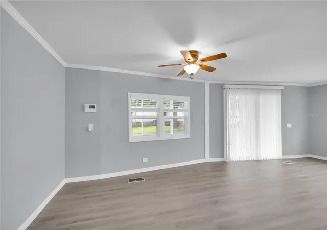Photo 3 of Manufactured home for sale at 100 Papaya Cvs, Leesburg, FL 34748 | MLS# G5109931 | Listing updated on 2026-08-22