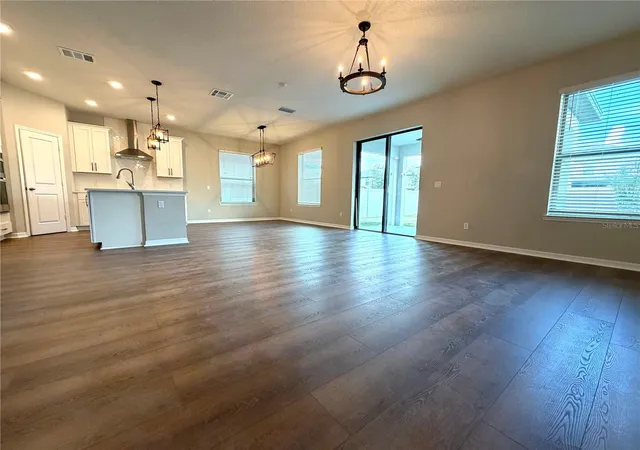 Photo 4 of Single family home for sale at 9872 Aurea Moss Ln, Orlando, FL 32832 | MLS# O6392632 | Listing updated on 2026-10-13