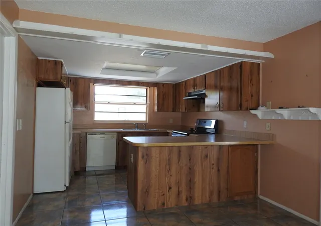 Photo 4 of Single family home for sale at 2128 Linwood Ave, Spring Hill, FL 34608 | MLS# TB8489155 | Listing updated on 2026-08-18