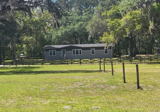Photo 2 of Single family home for sale at 22397 Mondon Hl Rd, Brooksville, FL 34601 | MLS# W7884115 | Listing updated on 2026-10-01
