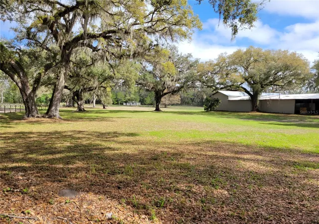 Photo 3 of Single family home for sale at 22397 Mondon Hl Rd, Brooksville, FL 34601 | MLS# W7884115 | Listing updated on 2026-10-01