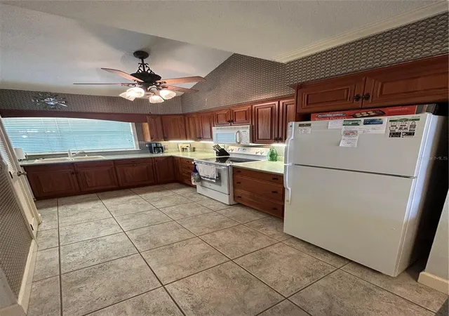 Photo 2 of Condo for sale at 11001 SE Sunset Harbor Rd #A04, Summerfield, FL 34491 | MLS# GC538732 | Listing updated on 2026-09-20