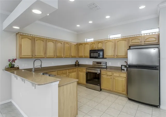 Photo 4 of Single family home for sale at 8415 Tarocco Ct, Land O Lakes, FL 34637 | MLS# TB8489308 | Listing updated on 2026-10-05