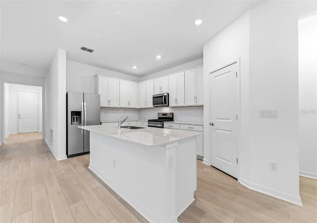 Photo 3 of Single family home for sale at 6607 Asbury Barnes Ln, Wesley Chapel, FL 33545 | MLS# TB8489422 | Listing updated on 2026-09-19