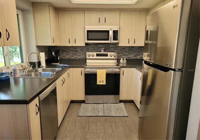 4th image of 3001 Landmark Blvd E #106, Palm Harbor, FL 34684 | MLS# TB8489612