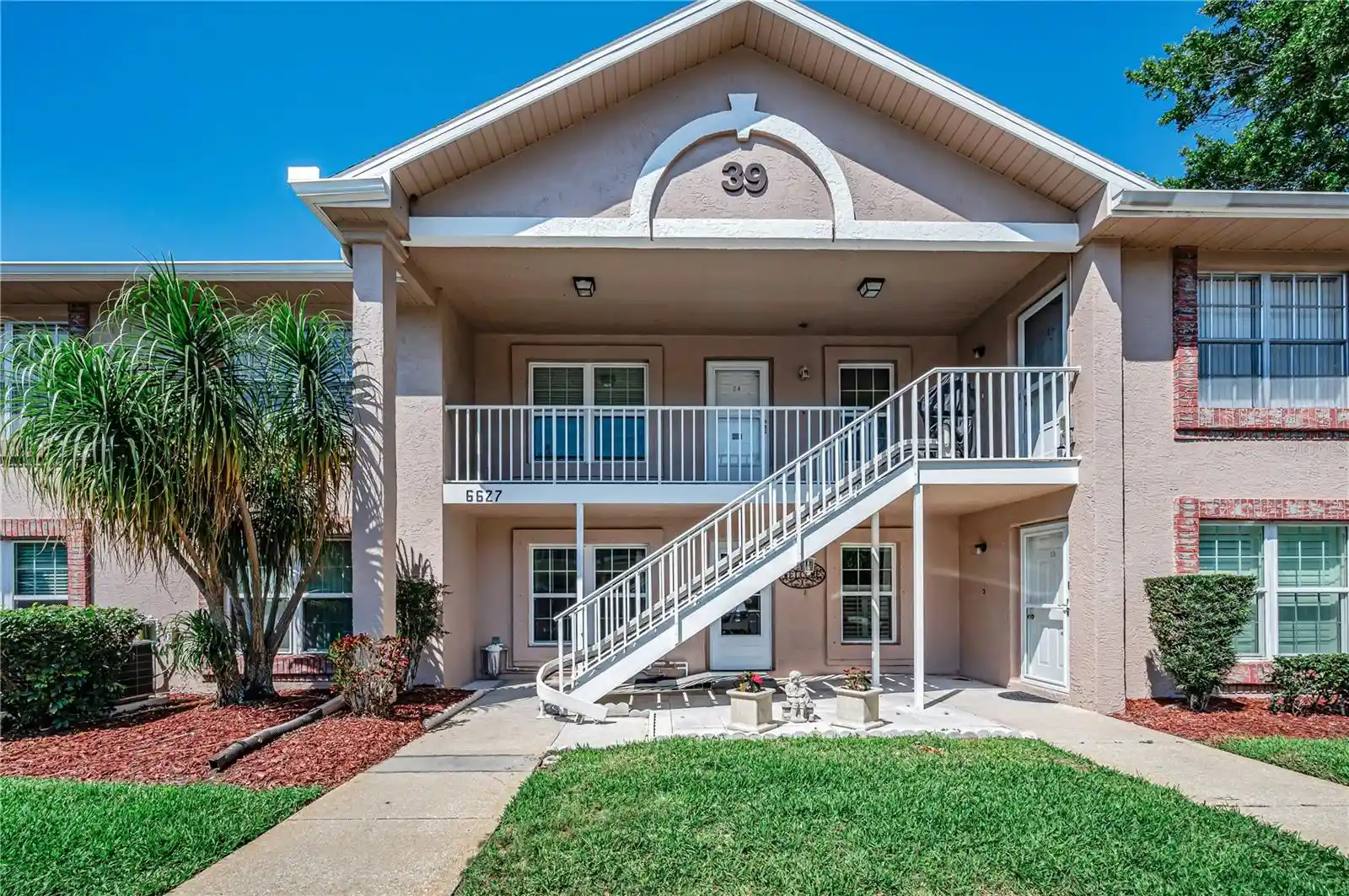 Listing Photo 1 - Condo for sale in 6627 Spring Flower Dr located at 6627 Spring Flower Dr, New Port Richey, FL 34653 - Unit #14