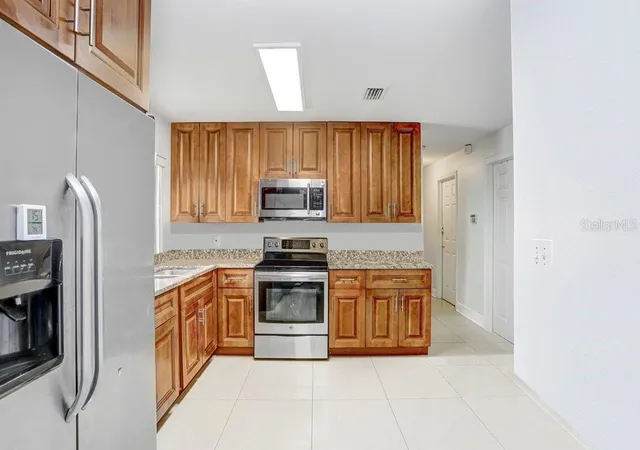 Photo 3 of Single family home for sale at 6923 N Himes Ave, Tampa, FL 33614 | MLS# TB8489761 | Listing updated on 2026-09-30