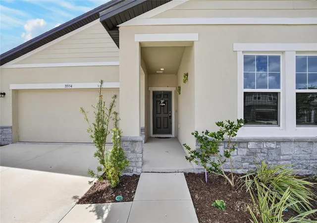 Photo 3 of Single family home for sale at 35554 Eastbrook Ave, Zephyrhills, FL 33541 | MLS# TB8490039 | Listing updated on 2026-10-07